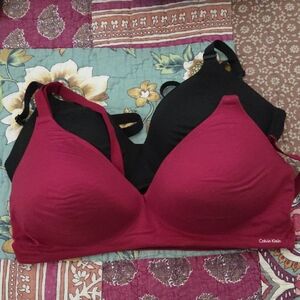 Qty 02 Calvin Klein Red and Black Seamless Bras with sewn in molded cups.